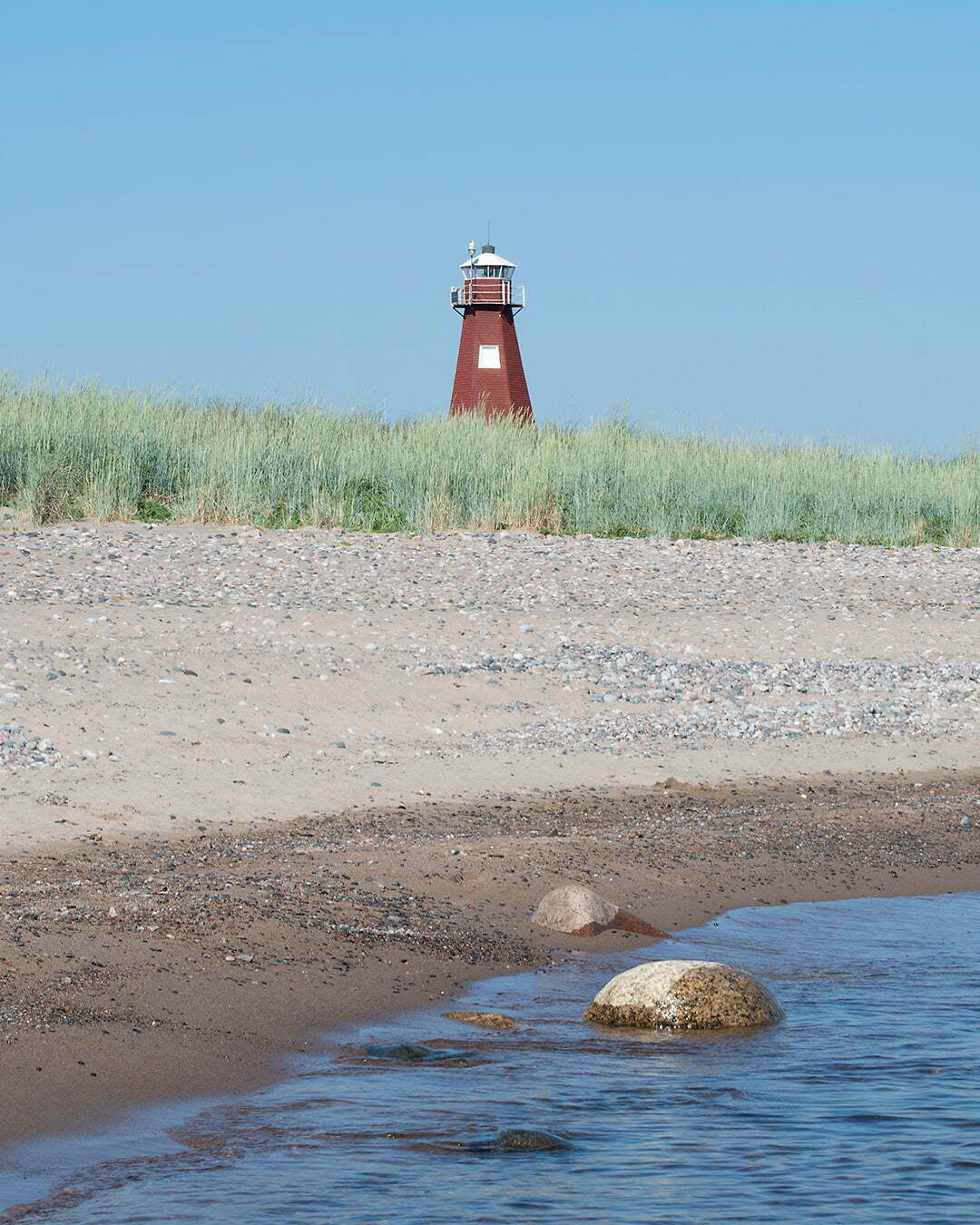 Malören fyren stranden vattnet 1080x1350